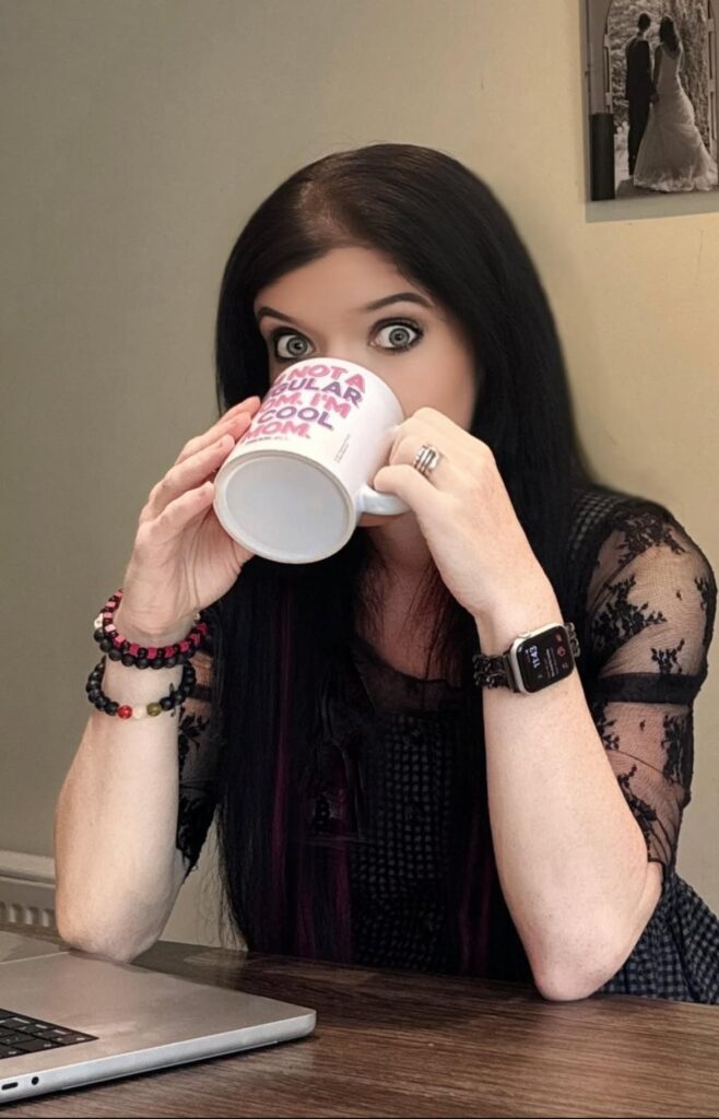 Woman holding a mug during a virtual brand photo shoot.